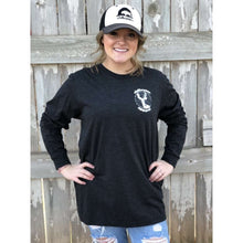 Woman in grey chillwater long sleeve t-shirt with buck design. Design features buck with snow in the background.
