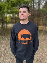 Chillwater's Buffalo design on a dark grey Long Sleeve worn by a young male with a forest behind him,