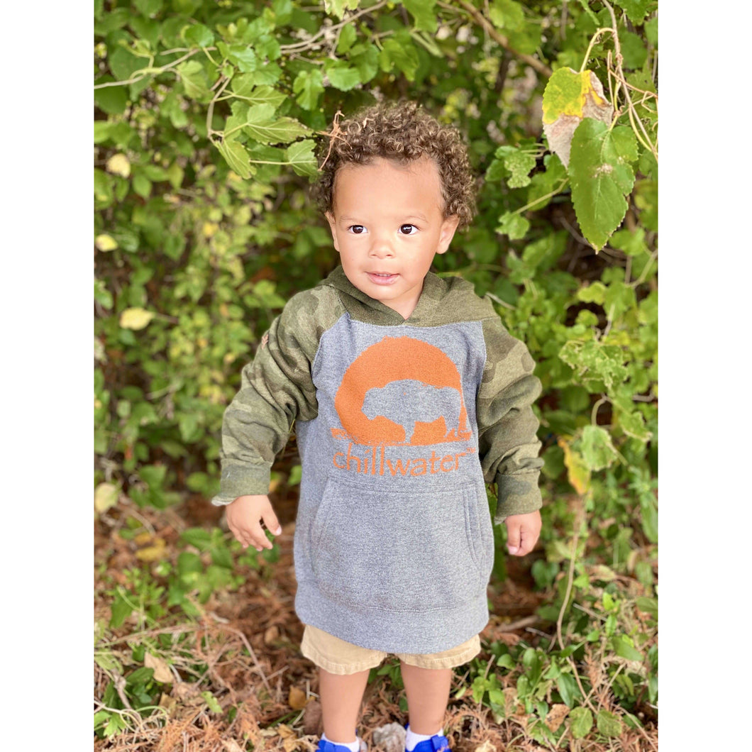Youth child wearing a light grey, camo, and orange Buffalo kids hoodie from Chillwater Apparel.
