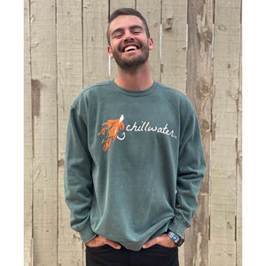 Man wearing green chillwater sweatshirt with hook and fly design. Design features an orange fly fishing hook.