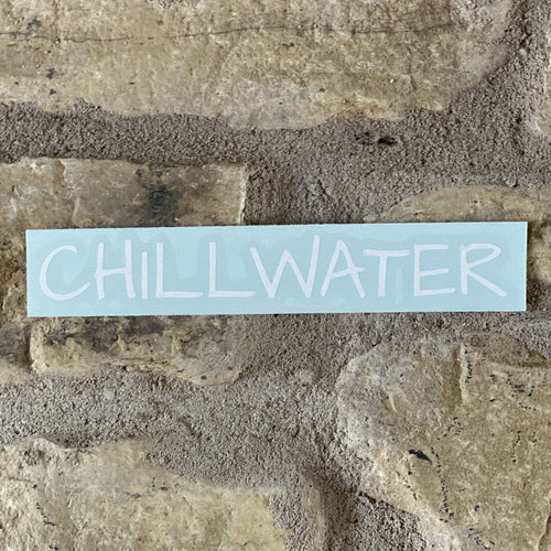 White transfer sticker in chillwater's beach bound font.