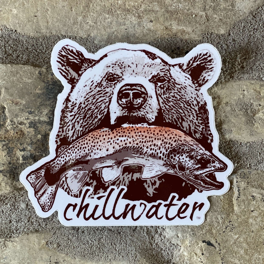Grizzly Bear Sticker with pink salmon in white background by Chillwater Apparel.