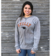 Faded grey Thermal Long Sleeve tee by Chillwater Apparel with the Stilly design on the front. The front pictures the words ‘Stilly” in orange and the state of Oklahoma in black with a star of Stillwater.