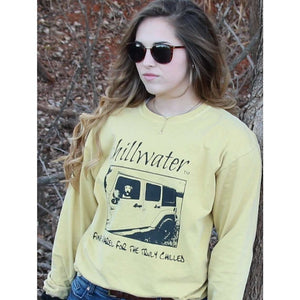 Yellow long sleeve comfort color tshirt with chillwater's jim tom design on the front center. Design includes chillwater lettering, photo of jim tom dog in a jeep and the words "fine apparel for the truly chilled". 