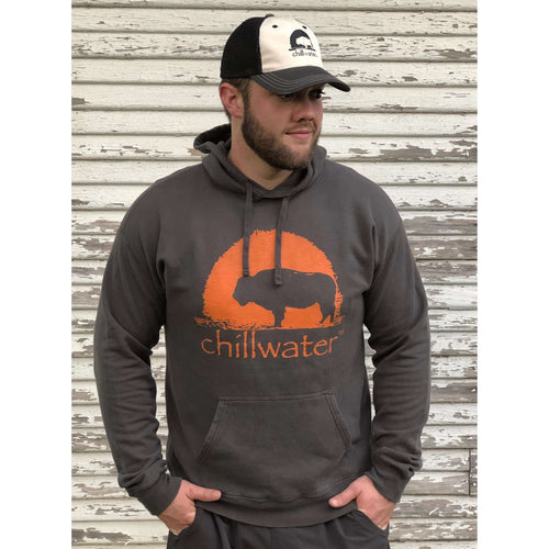 Man wearing Chillwater's buffalo comfort stretch hoodie, depicted on a grey background with an orange buffalo design. 