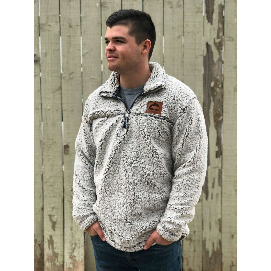Fluffy and comfy white with black accent sherpa. Has a brown Chillwater Buffalo design stiching on the left corner.