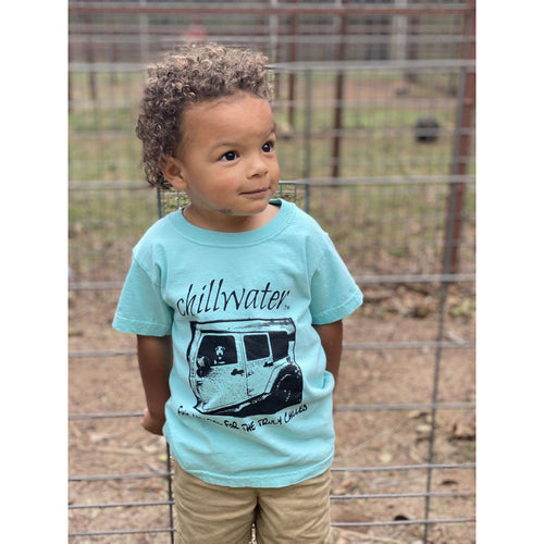 Youth size turquoise tshirt with chillwater's jim tom design on the front center. Design includes chillwater lettering, photo of jim tom dog in a jeep and the words 