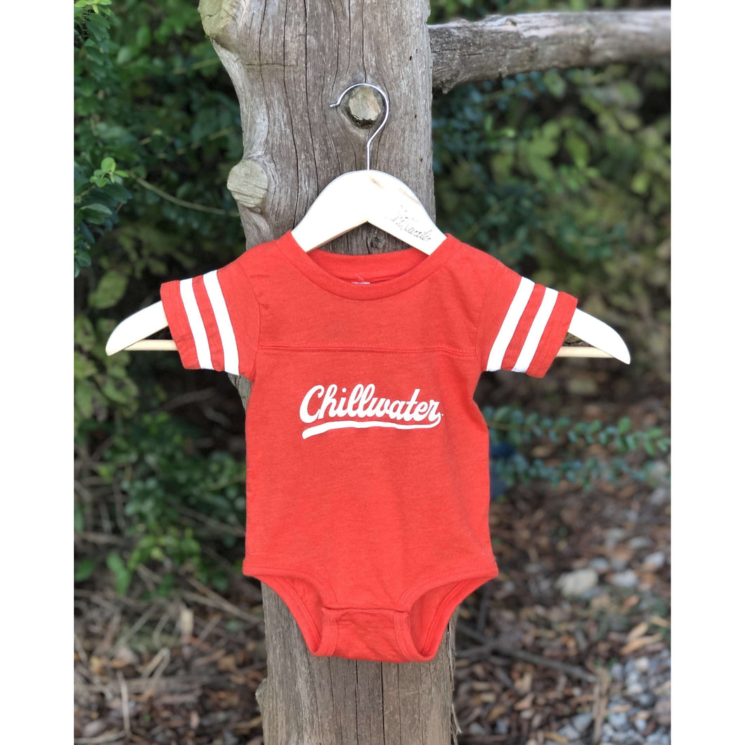 Vintage chill onesie for youth children by Chillwater Apparel in an orange color.